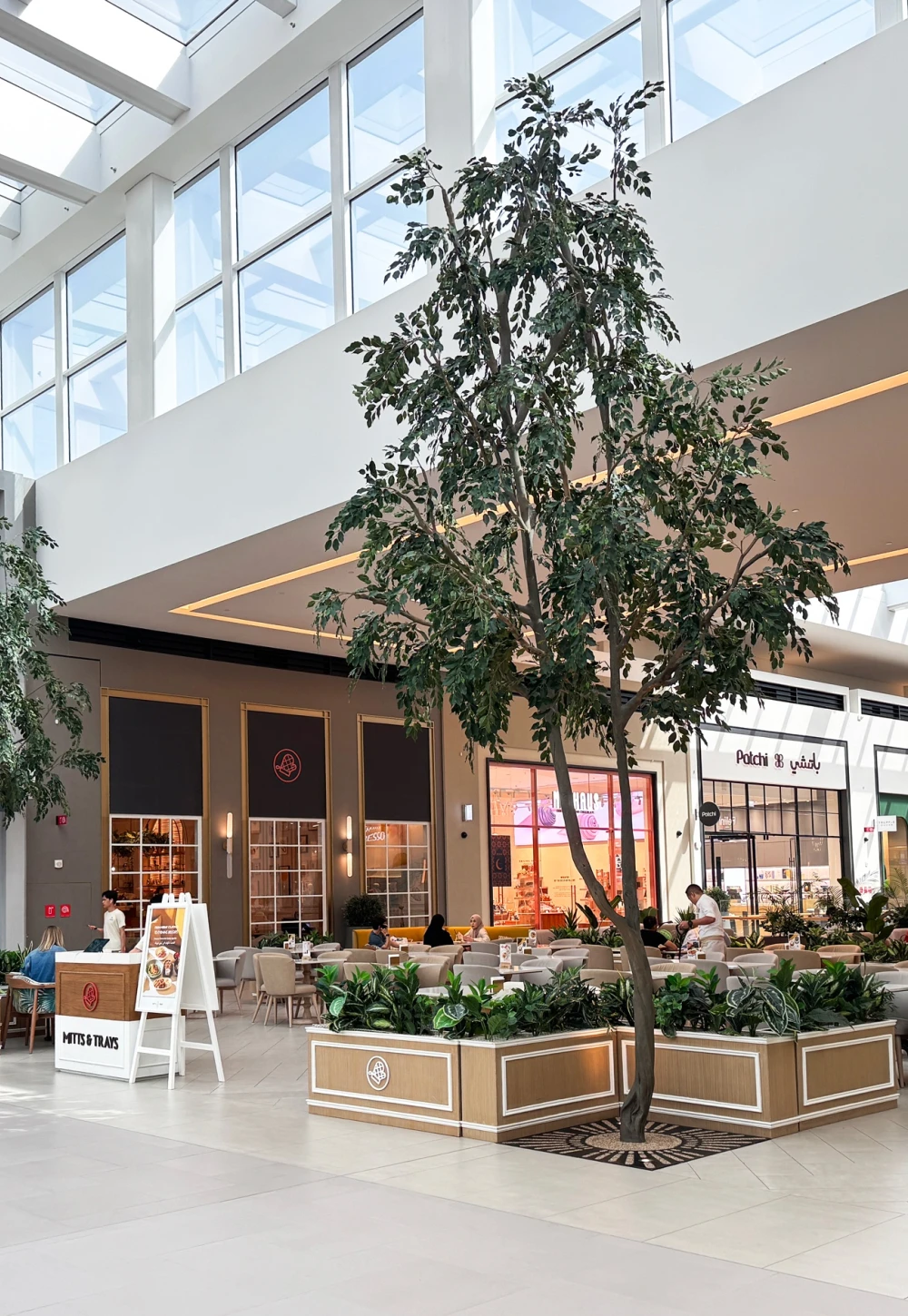 artificial ficus trees installed in Dubai Hills Mall